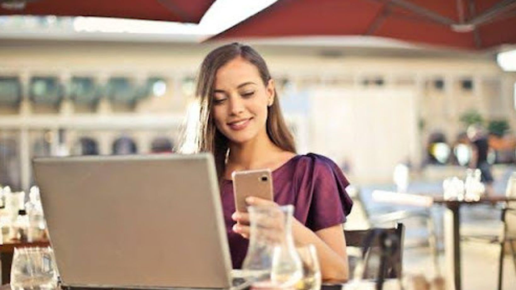 A woman looking at her phone